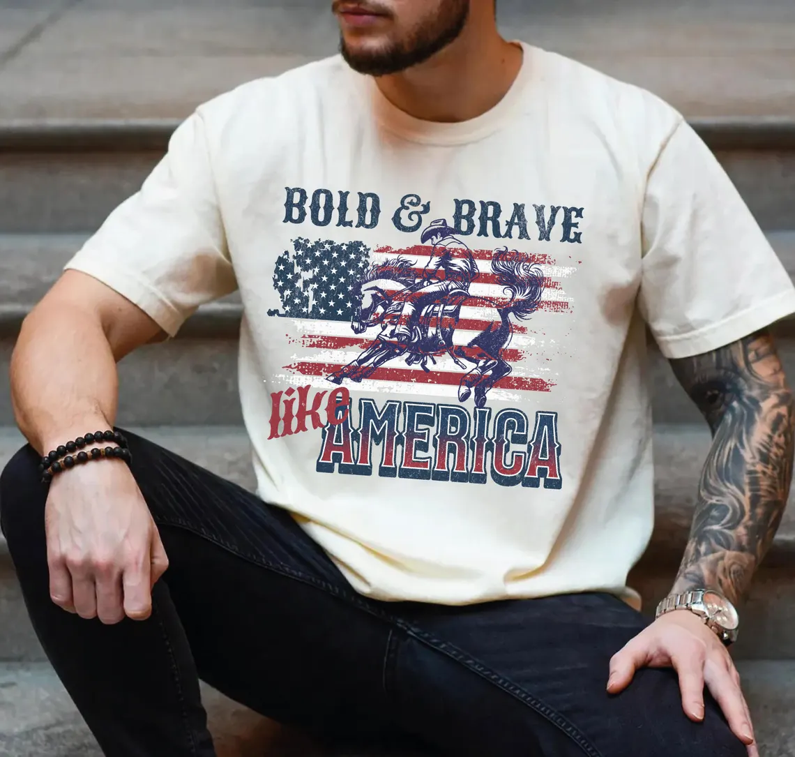 American Cowboy T-Shirt – Bold & Brave Like America, Vintage Western Rodeo Tee with USA Flag for 4th of July & Memorial Day