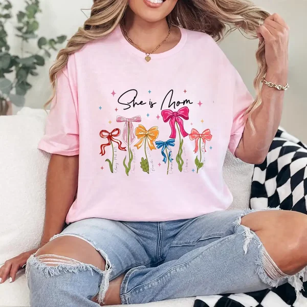 She Is Mom T-Shirt – Retro Coquette Bow Christian Mom Shirt, Bible Verse 'She Is Strong' Tee, Cute Mother's Day Gift for Faithful Mama - Image 2